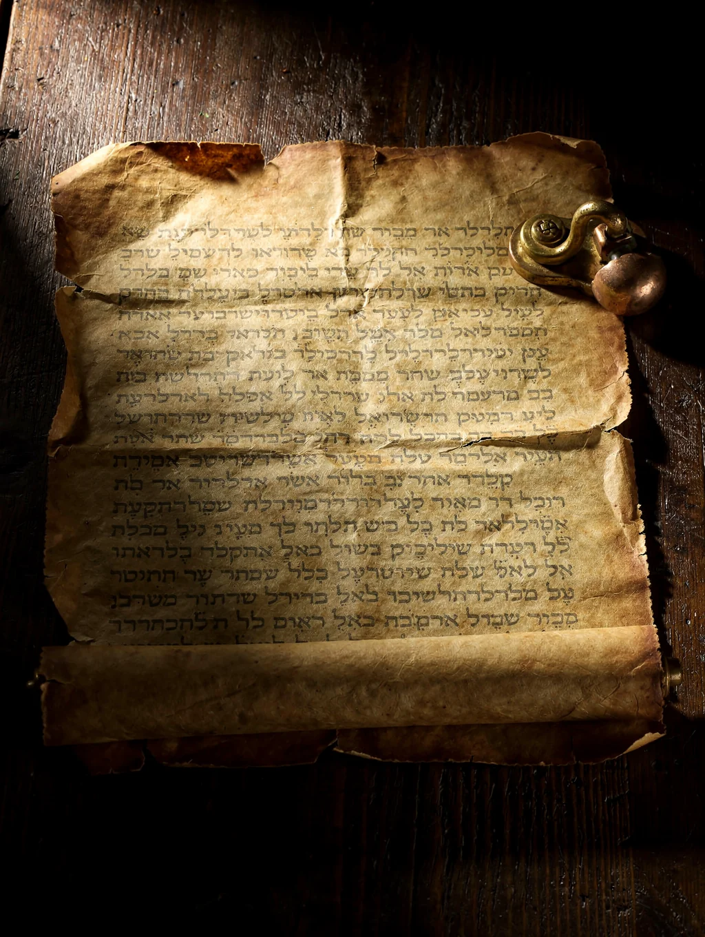 Preserved leather parchment scroll segment showing ancient Hebrew script